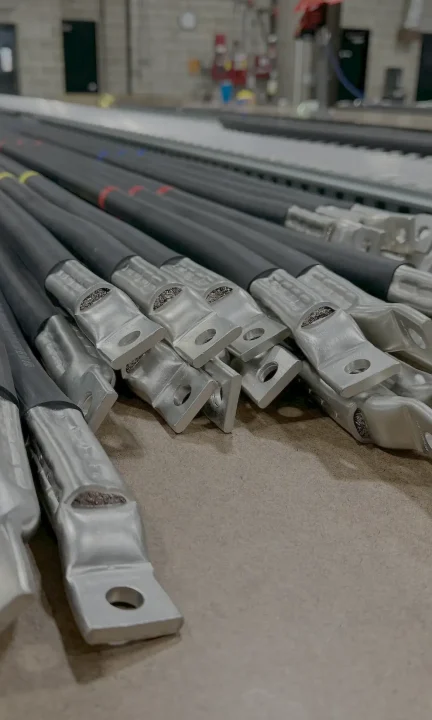 Finished heavy-duty cable assemblies with compressed terminals